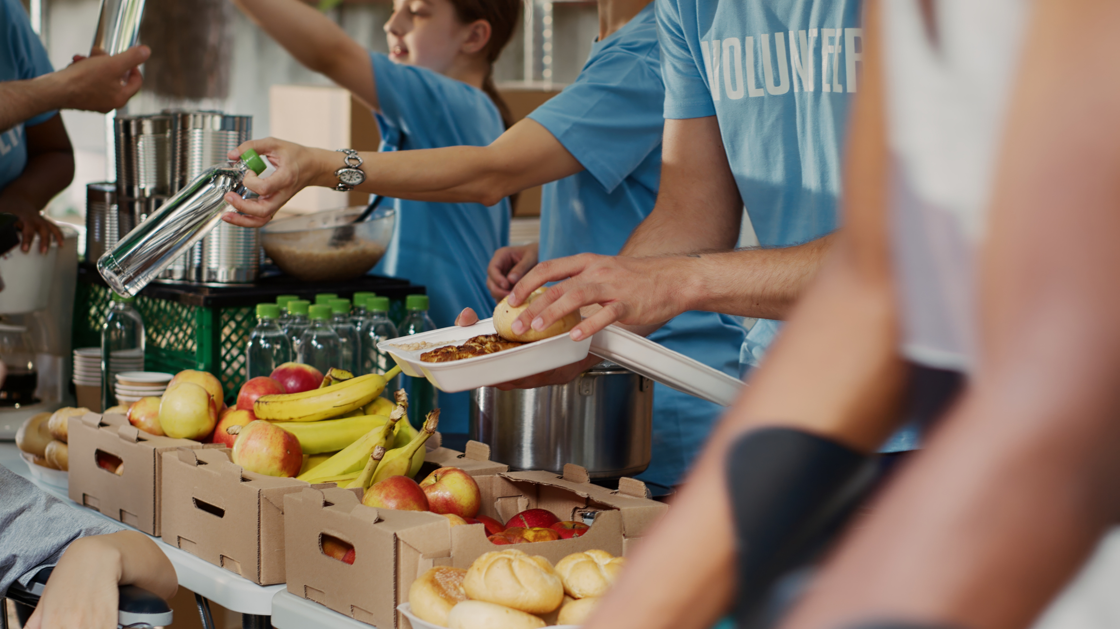 Volunteers handing out food