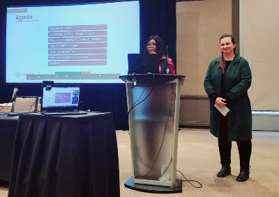Liz and Danielle present at the conference